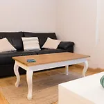 Confort en el Centro de la Ciudad Apartamento con patio privado Parking opcional