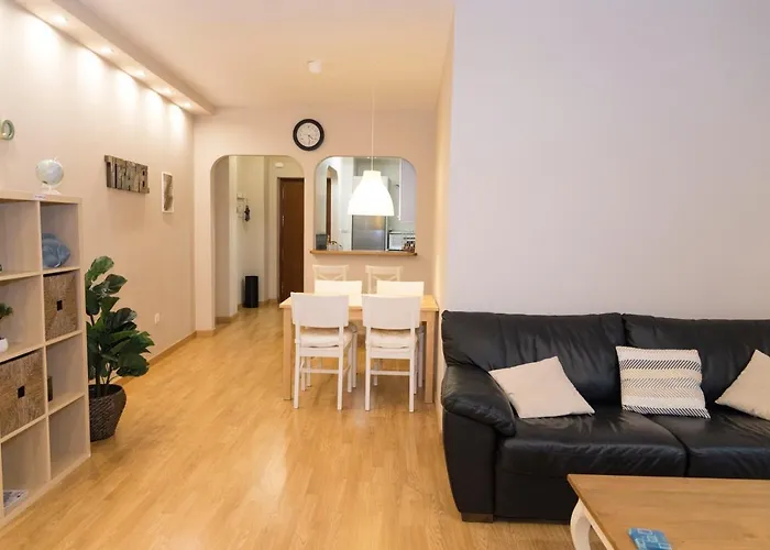 Confort en el Centro de la Ciudad Apartamento con patio privado Parking opcional