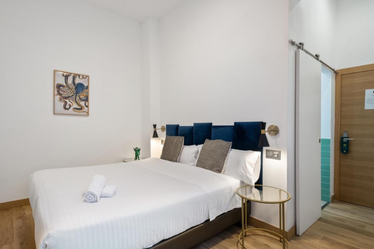 Malaga City Suites Hotel