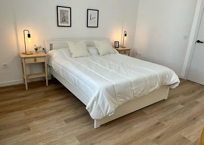 Suites Larios Rooms