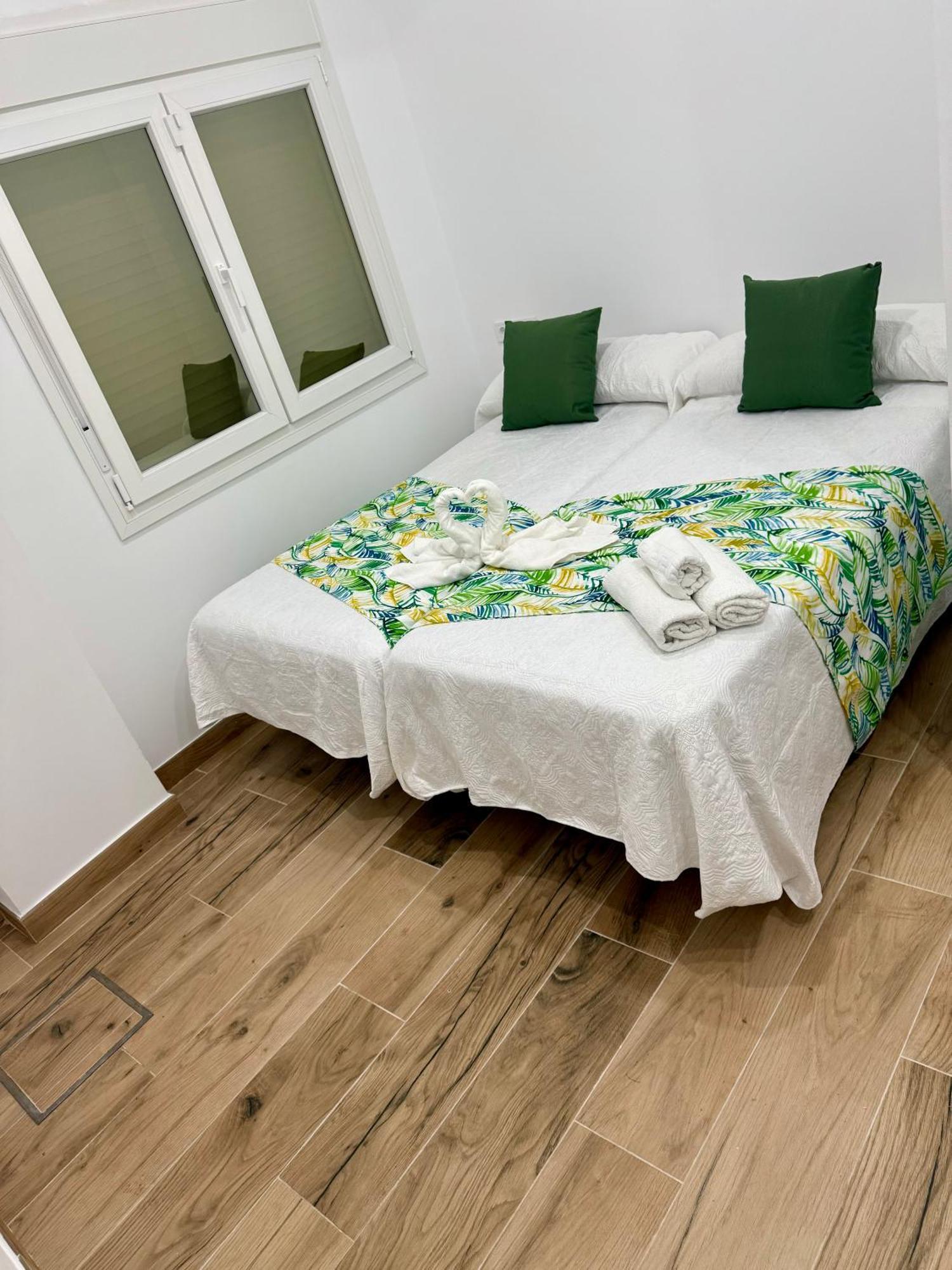 1 * Malaga